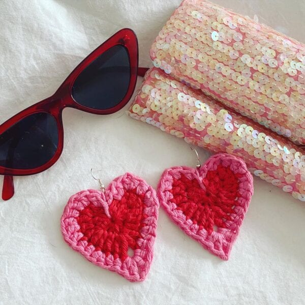 Earrings, sunglasses and a bag made by Magi Tudur